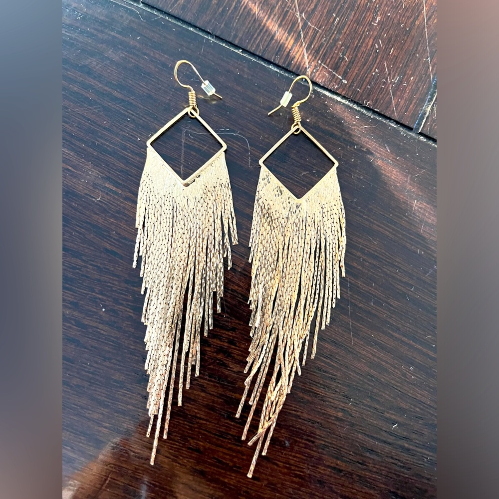Costume gold tone statement earrings